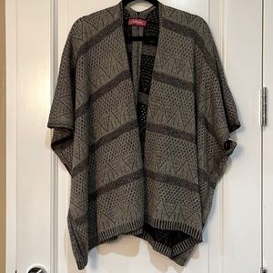 Knitted poncho like sweater, silver and black color